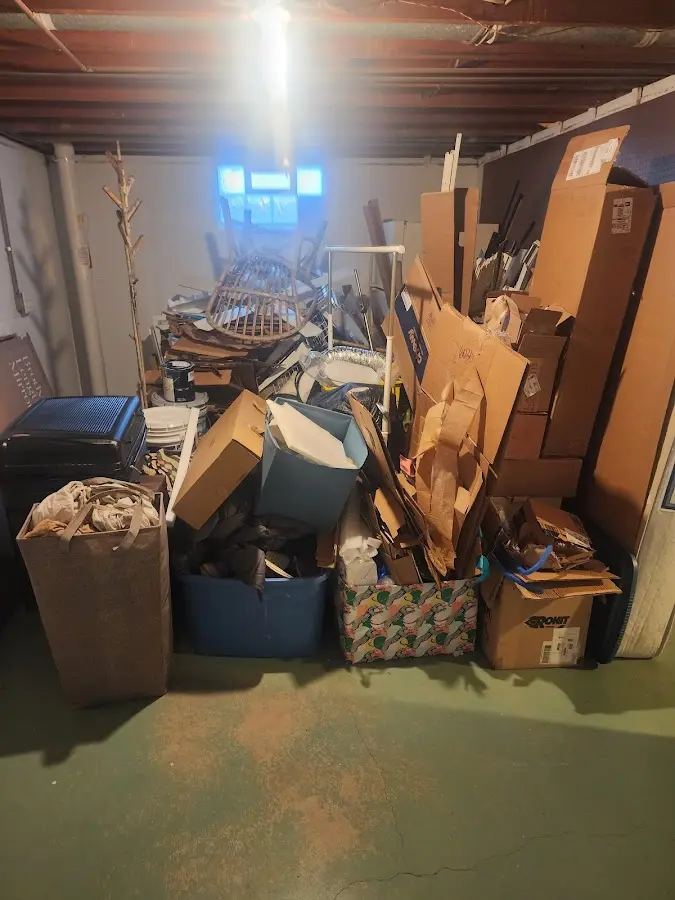 Roll-off dumpster container at job site for 15 Yard Dumpster Rental in Lindenhurst